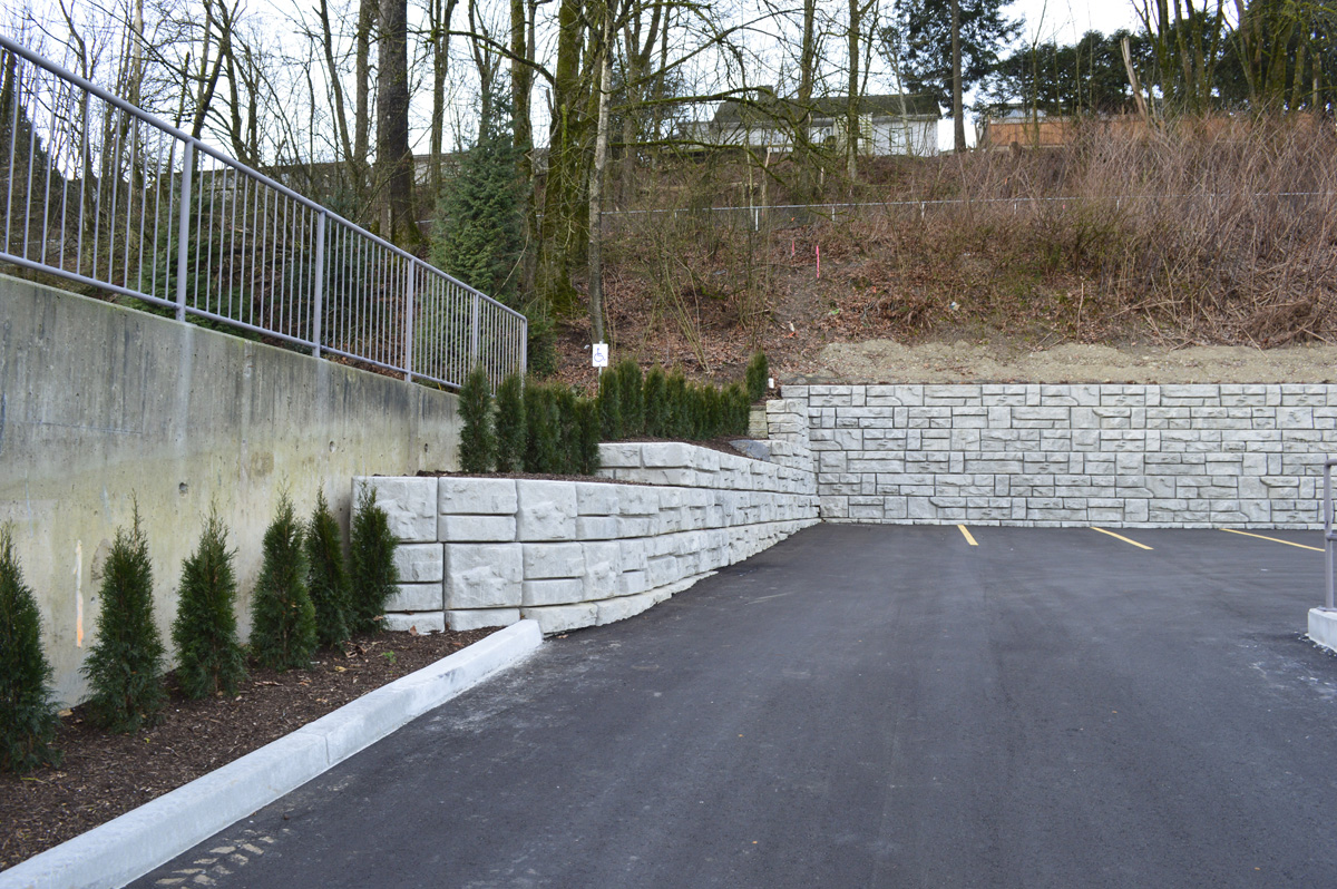 redi-rock gravity retaining wall in a parking lot